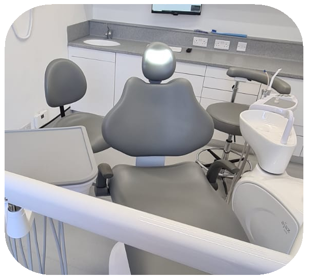 Dental chair and examination table in a clinical setting