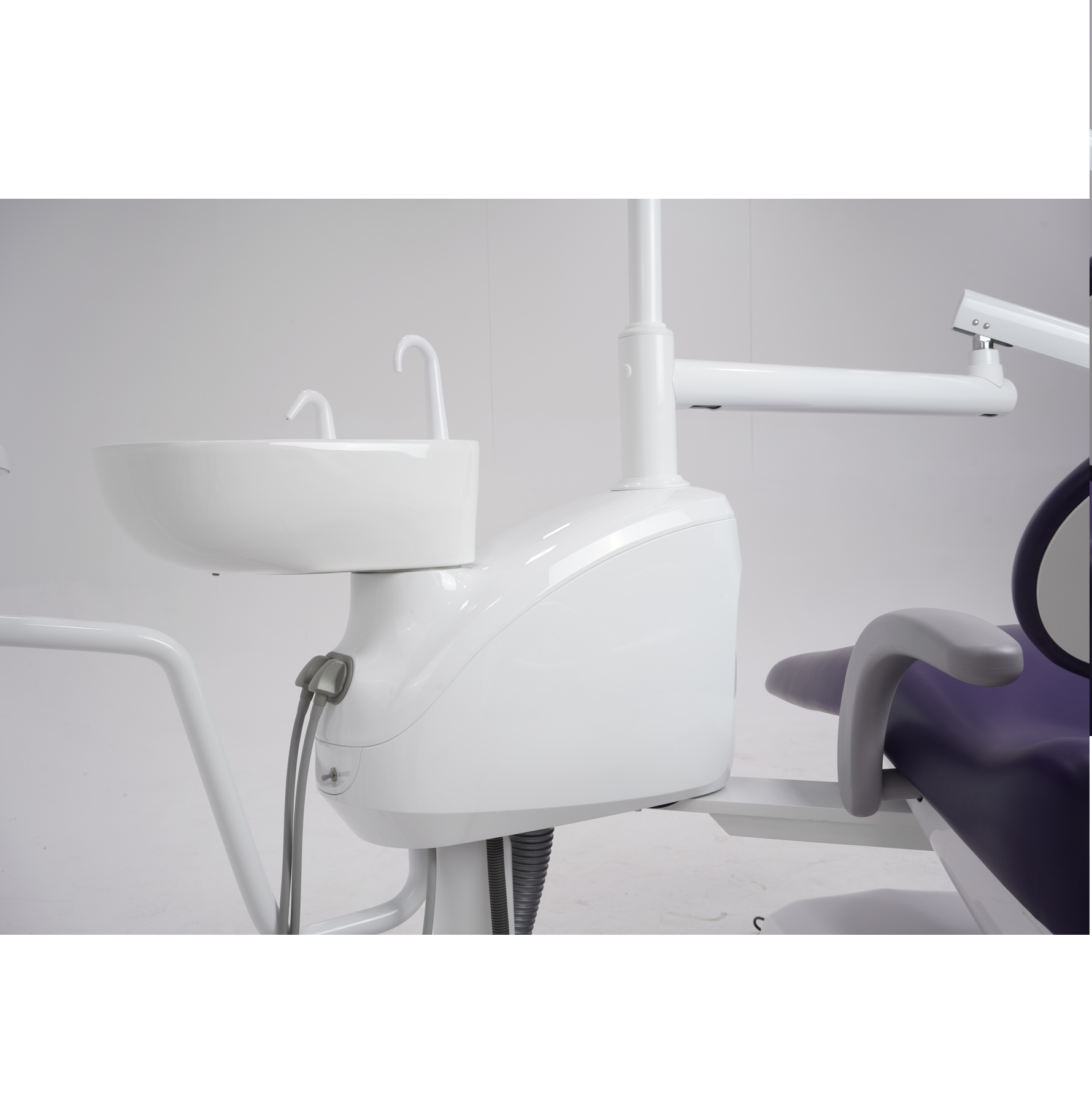 Dental chair and sink setup in a clinical setting